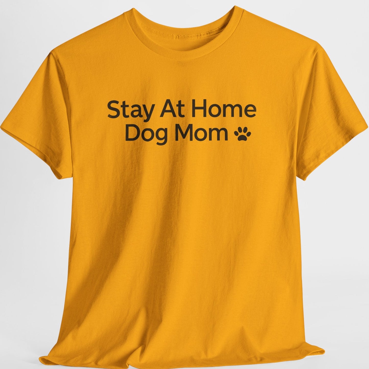 Gold t-shirt with 'Stay At Home Dog Mom' text on a white background