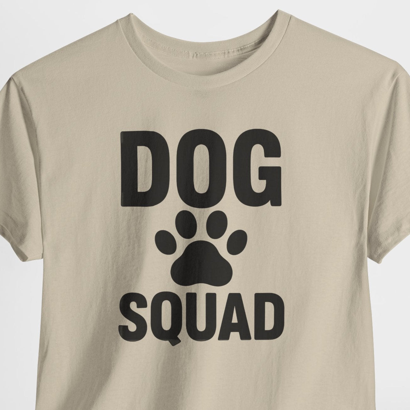 Beige t-shirt with 'DOG SQUAD' text and paw print on a white background