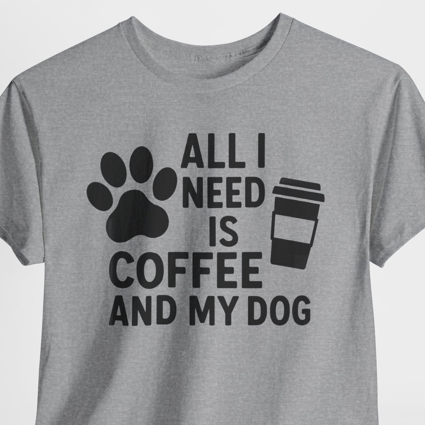 Gray t-shirt with 'All I Need is Coffee and My Dog' text and graphics on a white background