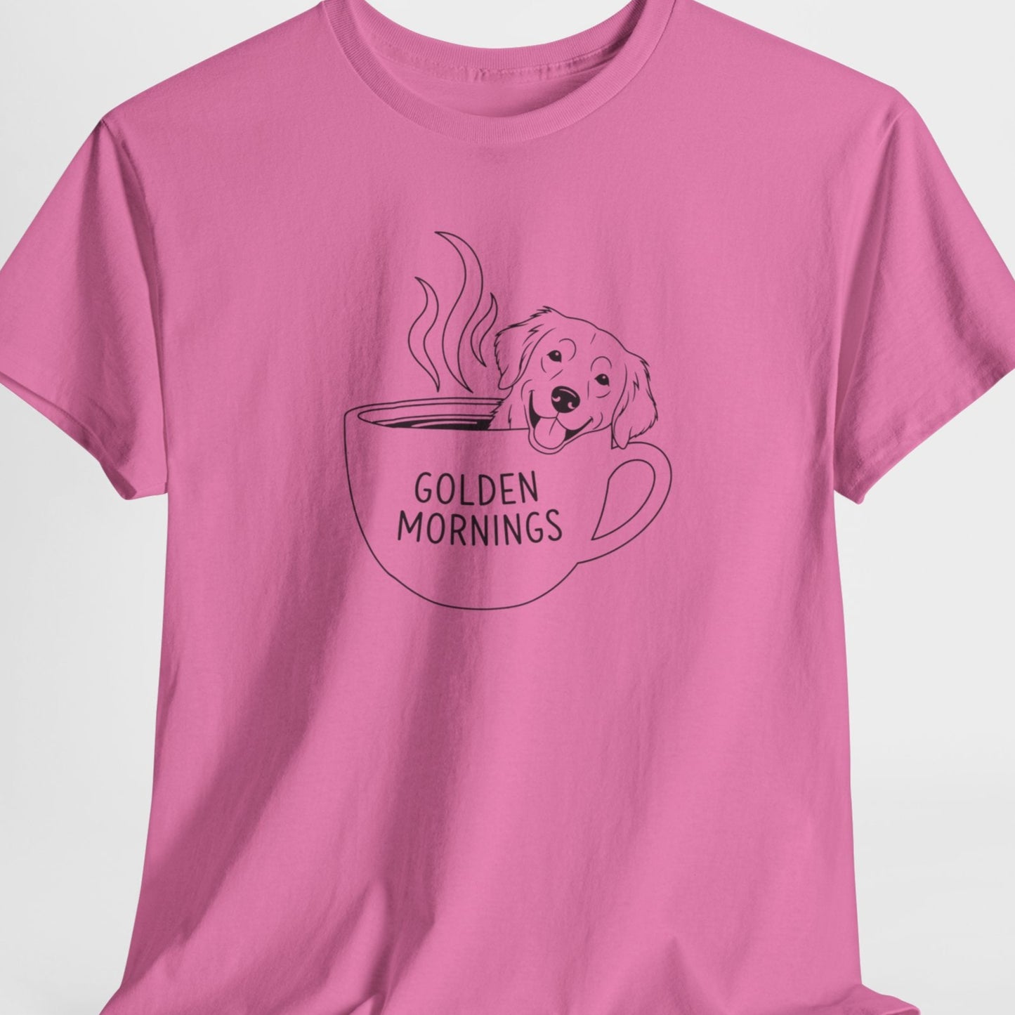 Pink t-shirt with a graphic of a dog in a coffee cup and 'Golden Mornings' text on a white background