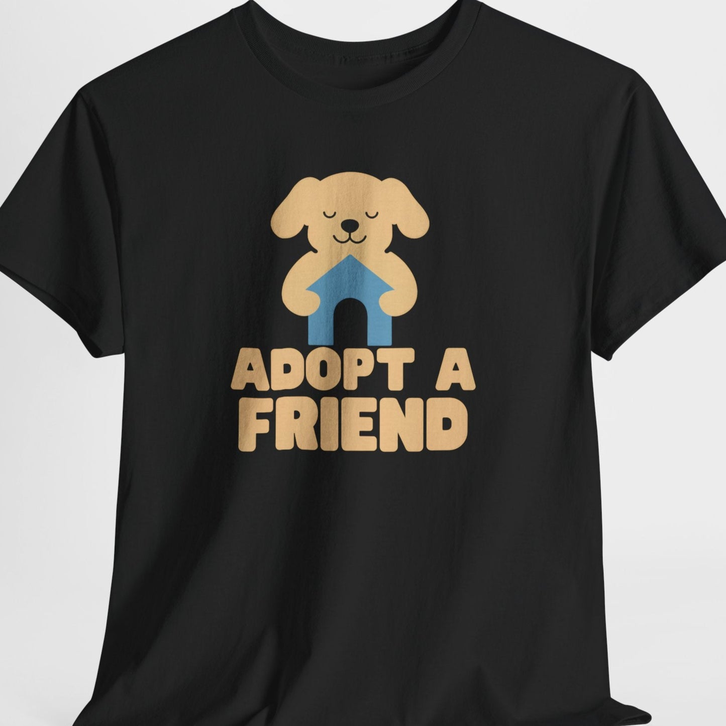Black t-shirt with a dog graphic and 'Adopt a Friend' text on a white background