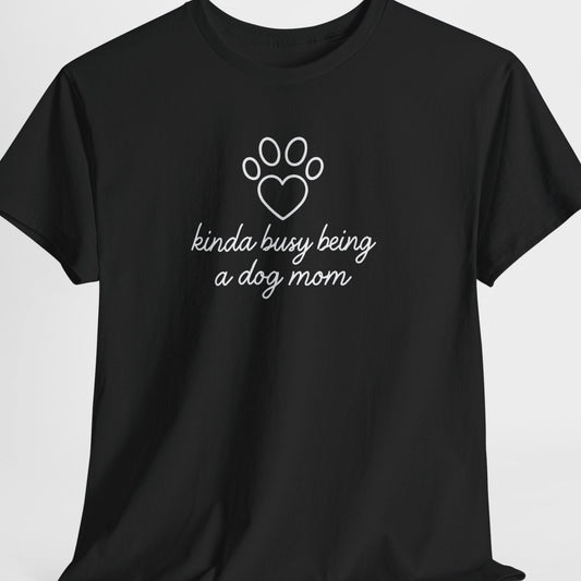 Black t-shirt with white text and paw print design on a light gray background