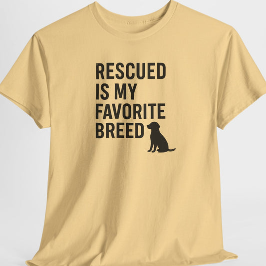 Beige t-shirt with 'Rescued is my favorite breed' text and dog silhouette on a light gray background