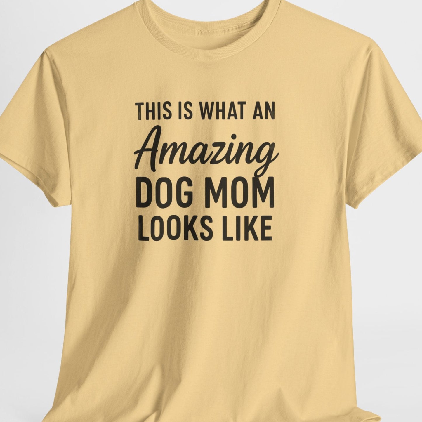 Beige t-shirt with black text on a light gray background
