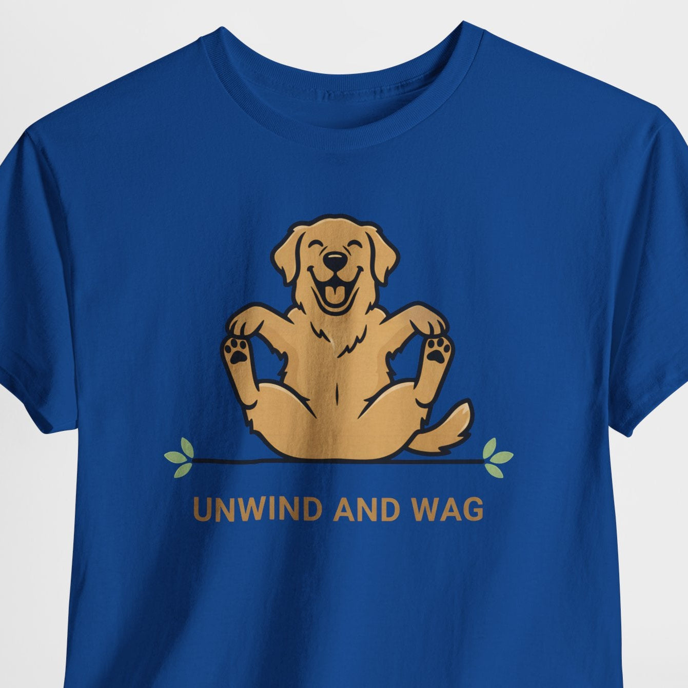 Blue t-shirt with a dog graphic and 'Unwind and Wag' text on a white background