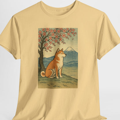 Beige t-shirt with a dog and cherry blossom tree graphic on a white background