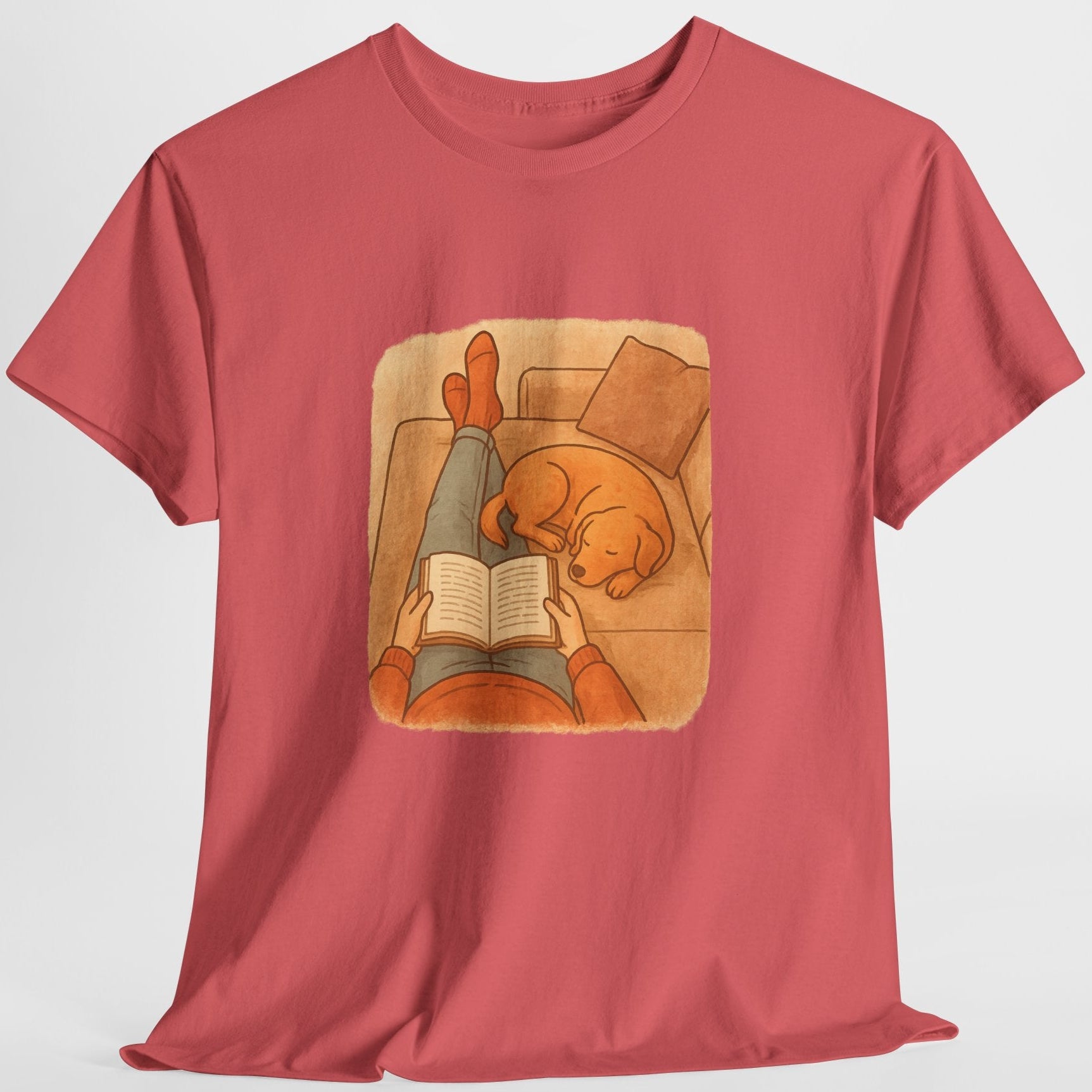 Red t-shirt with a graphic of a person reading a book to a dog on a white background