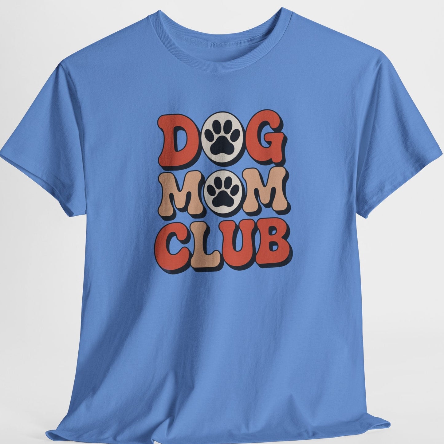Blue t-shirt with 'DOG MOM CLUB' text and paw prints on a light gray background