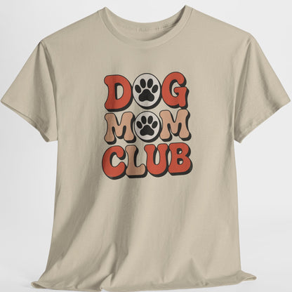 Beige t-shirt with 'Dog Mom Club' text and paw prints on a white background