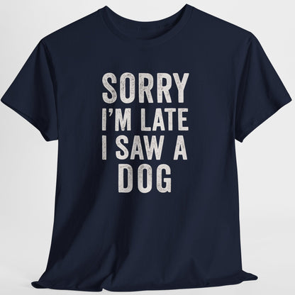 Navy blue t-shirt with white text 'Sorry I'm late I saw a dog' on a light gray background