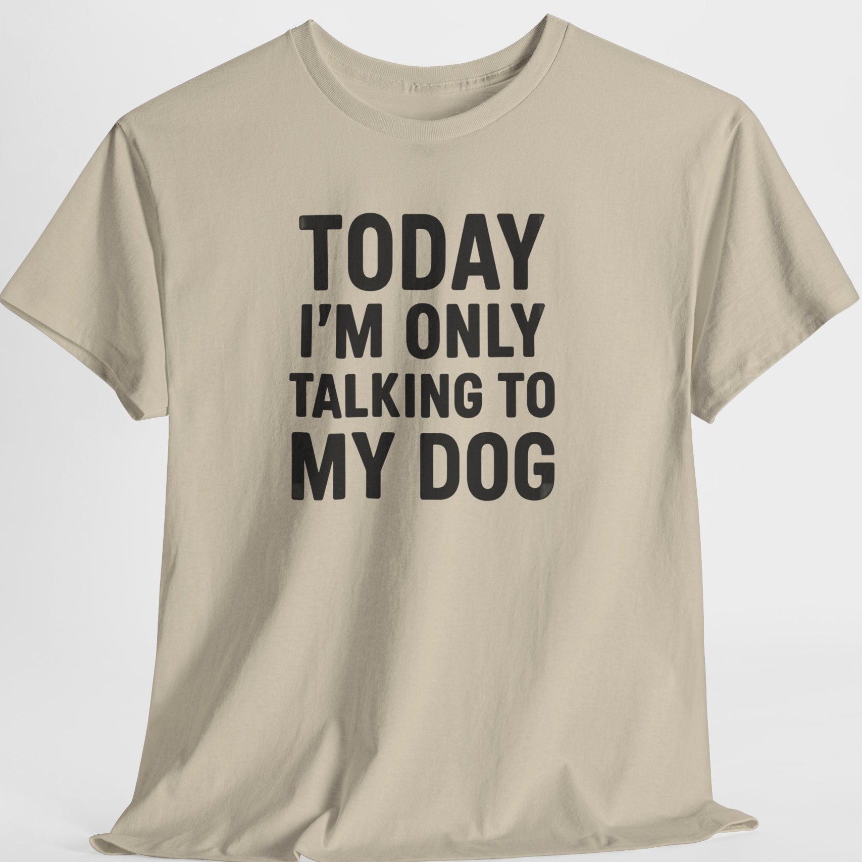 Beige t-shirt with text 'Today I'm only talking to my dog' on a white background